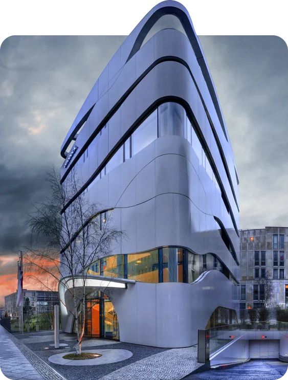 Contemporary curved-facade building designed with flowing horizontal bands